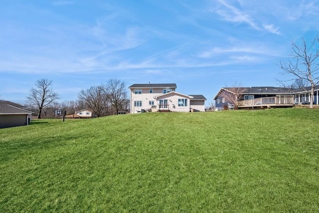 view of yard featuring a wooden deck