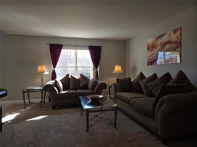 living room with baseboards and carpet floors