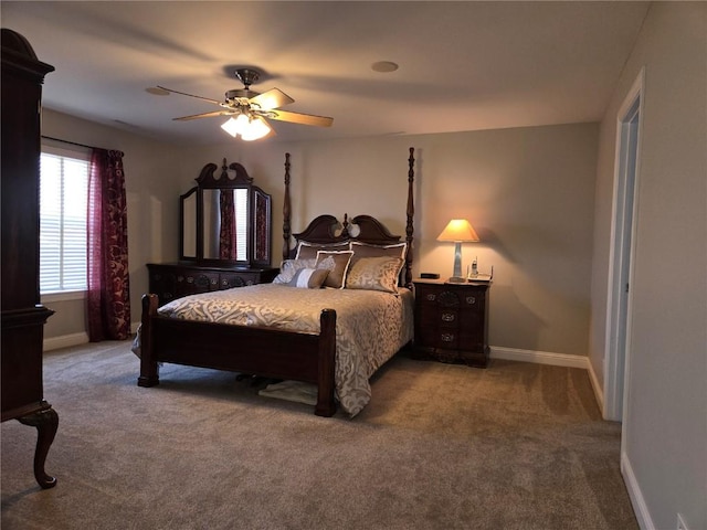 bedroom with carpet flooring, a ceiling fan, and baseboards