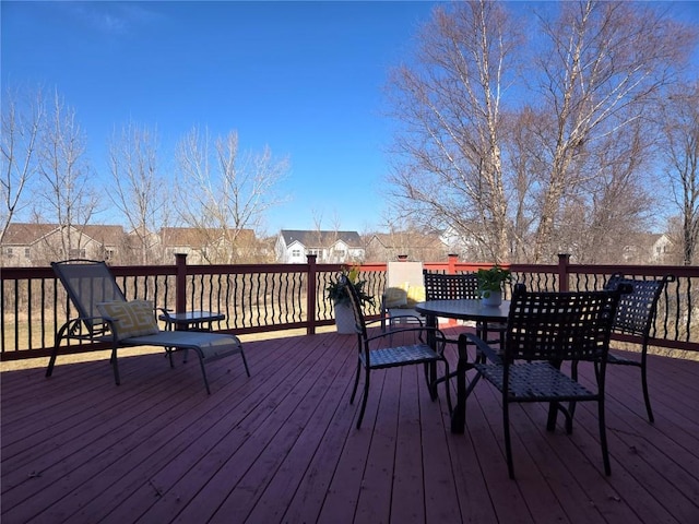 deck with outdoor dining space