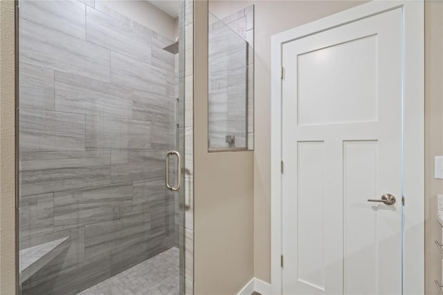 full bathroom featuring a shower stall