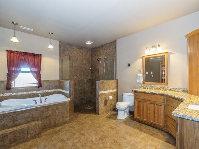 bathroom with visible vents, toilet, walk in shower, a bath, and vanity