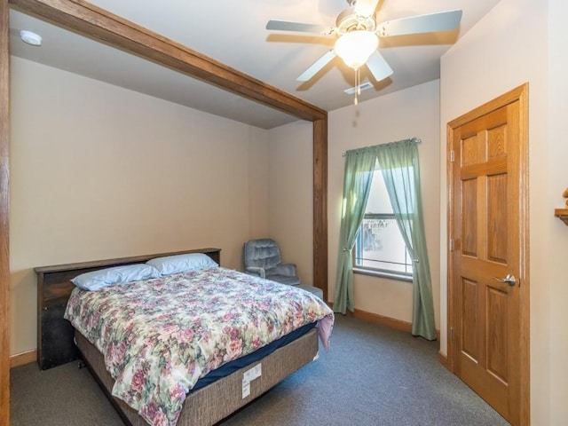 carpeted bedroom with baseboards and a ceiling fan