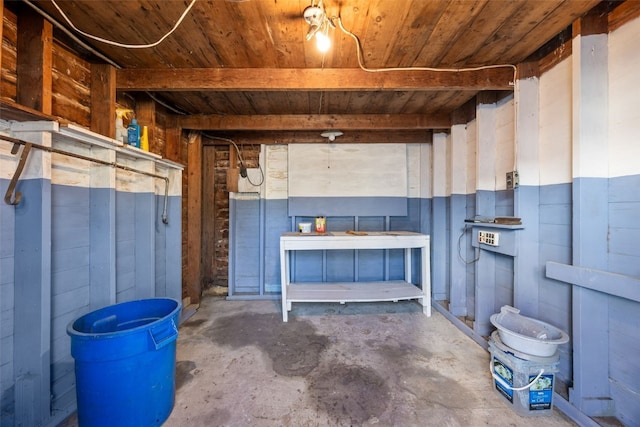 basement featuring wood ceiling