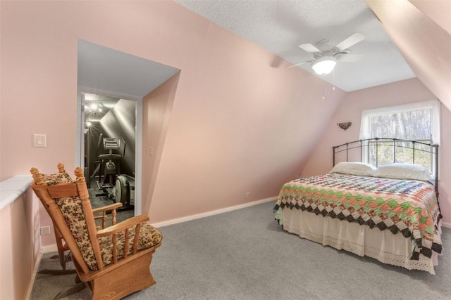 3098 Sandy Beach Rd NE, Solon, IA 52333 - carpeted bedroom featuring baseboards, a textured ceiling, ceiling fan, and vaulted ceiling