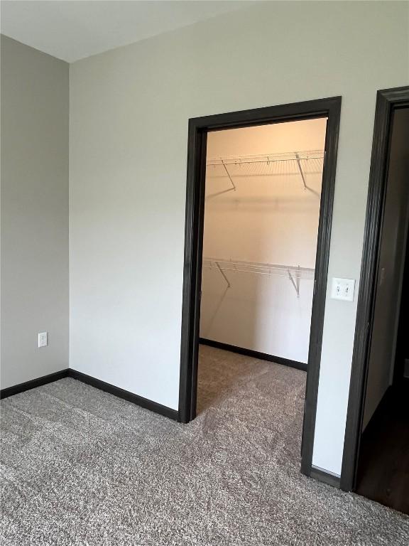 empty room with baseboards