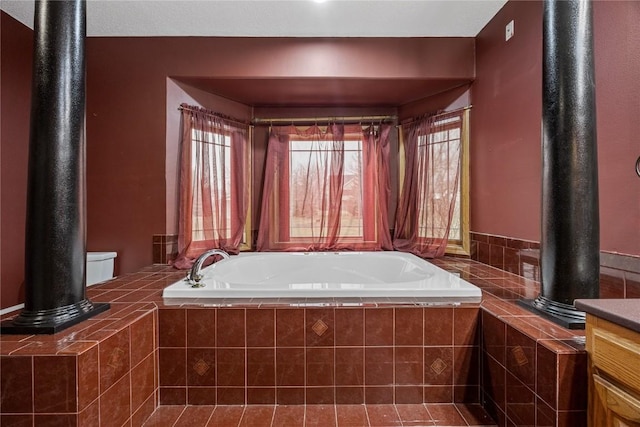 7012 Deer Horn Trl NE, Cedar Rapids, IA 52411 - bathroom with a bath, toilet, and vanity