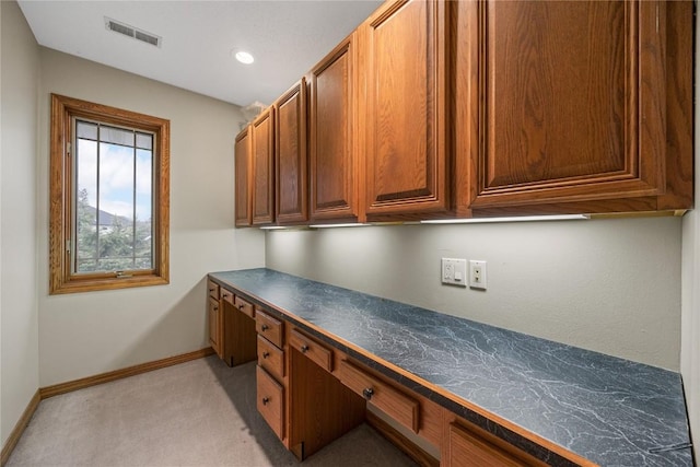 7012 Deer Horn Trl NE, Cedar Rapids, IA 52411 - unfurnished office with built in desk, light colored carpet, baseboards, and recessed lighting