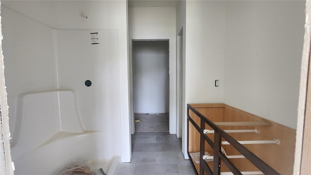 9124 Grand Oaks Dr NE, Cedar Rapids, IA 52402 - hallway featuring a wainscoted wall