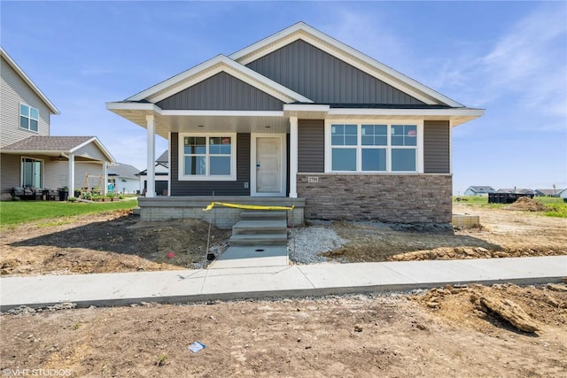 2701 Roycroft Dr, Marion, IA 52302 - view of front facade with covered porch and stone siding