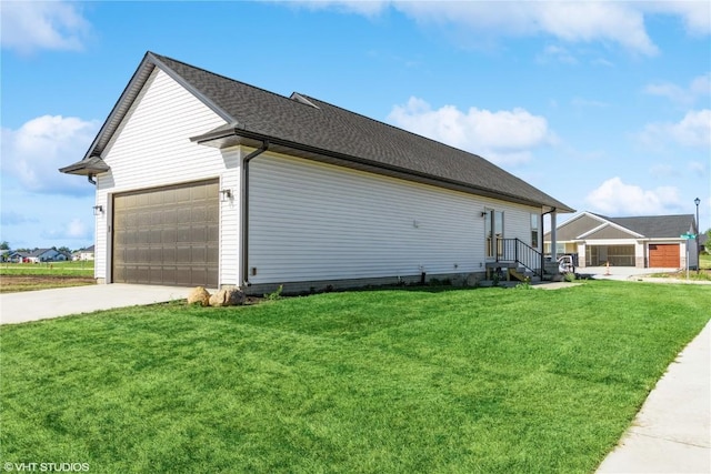 view of property exterior with a garage, a lawn, and concrete driveway