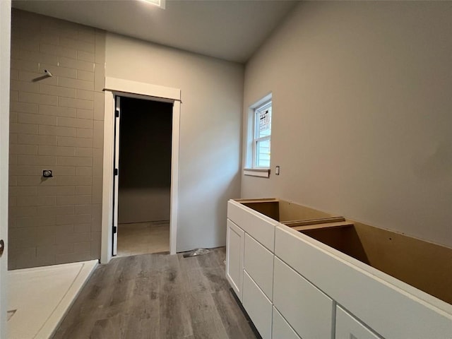 hall featuring wood finished floors