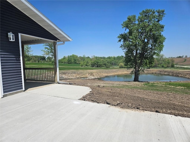 7936 217th Ave, Martelle, IA 52305 - view of patio featuring a water view