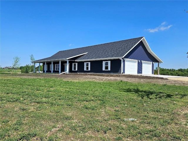 7936 217th Ave, Martelle, IA 52305 - ranch-style home featuring a front lawn and a garage