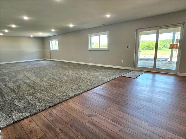 7936 217th Ave, Martelle, IA 52305 - unfurnished room featuring hardwood / wood-style floors, baseboards, and recessed lighting