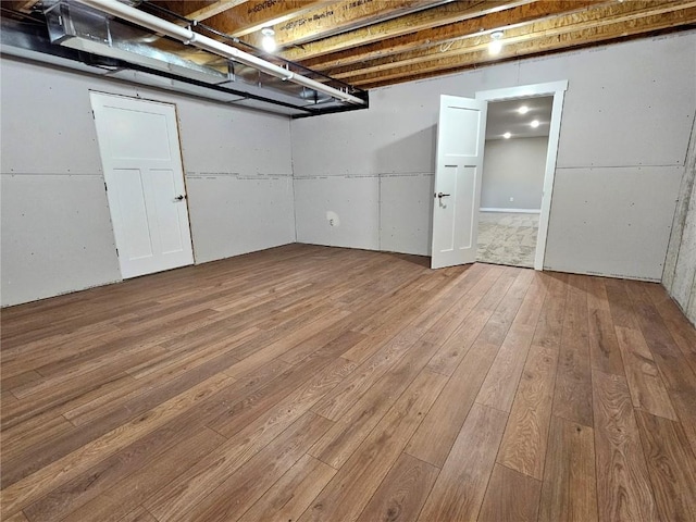 7936 217th Ave, Martelle, IA 52305 - finished basement with hardwood / wood-style floors