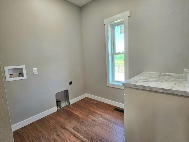 7936 217th Ave, Martelle, IA 52305 - laundry room featuring hookup for a washing machine, dark wood-style floors, baseboards, and hookup for an electric dryer