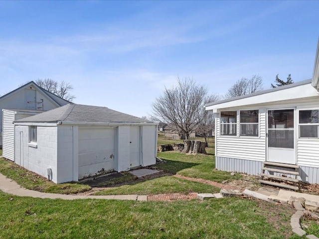 view of yard with entry steps and an outdoor structure