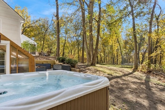 view of yard featuring a hot tub