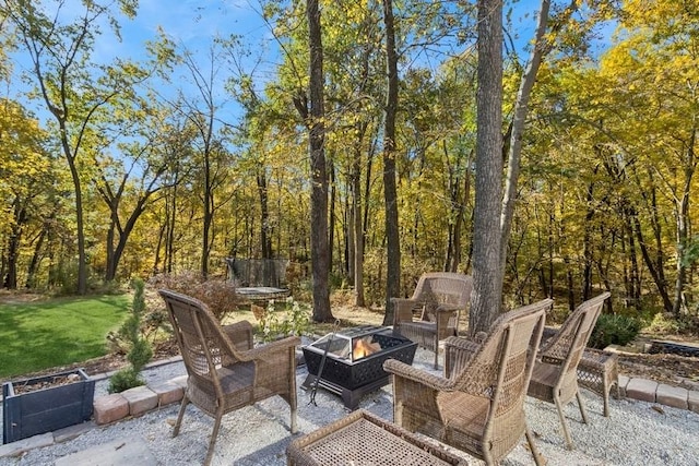 view of patio / terrace featuring a fire pit