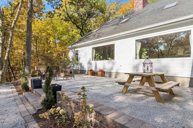 view of patio with outdoor dining area