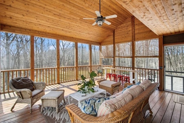sunroom featuring an outdoor living space and ceiling fan