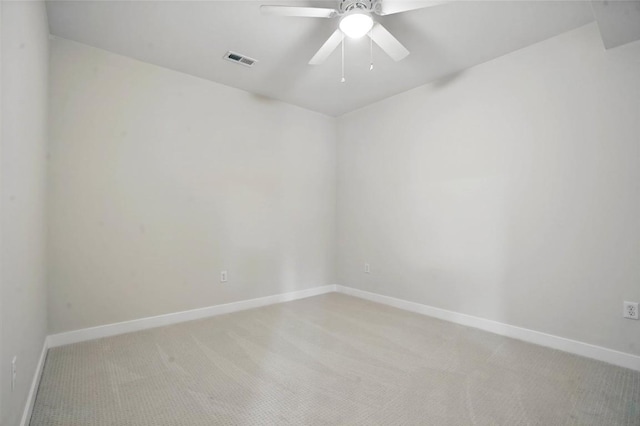 878 Silver Ln, Iowa City, IA 52245 - empty room featuring light carpet, baseboards, and a ceiling fan