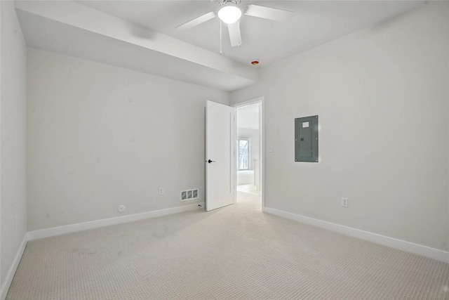 878 Silver Ln, Iowa City, IA 52245 - unfurnished room featuring electric panel, baseboards, light colored carpet, and ceiling fan