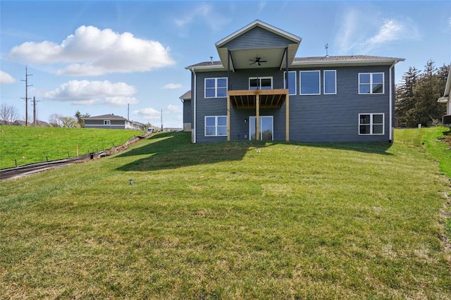 878 Silver Ln, Iowa City, IA 52245 - rear view of house with a yard and a balcony