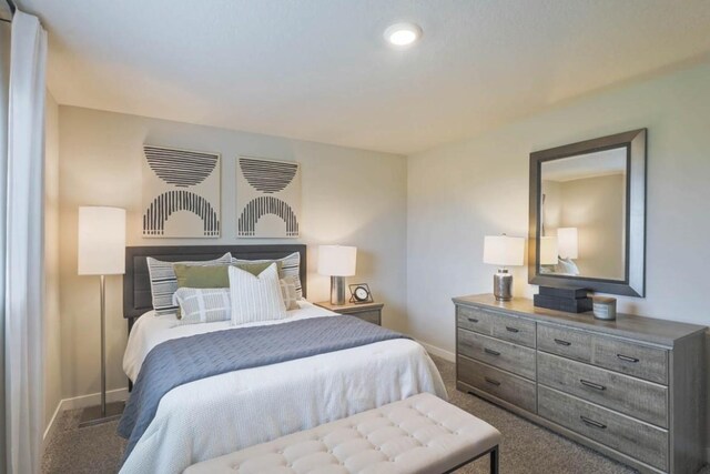 707 Thomas St, Tiffin, IA 52340 - carpeted bedroom with baseboards