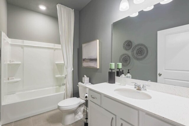 707 Thomas St, Tiffin, IA 52340 - bathroom with tile patterned floors, vanity, toilet, and shower / bath combo