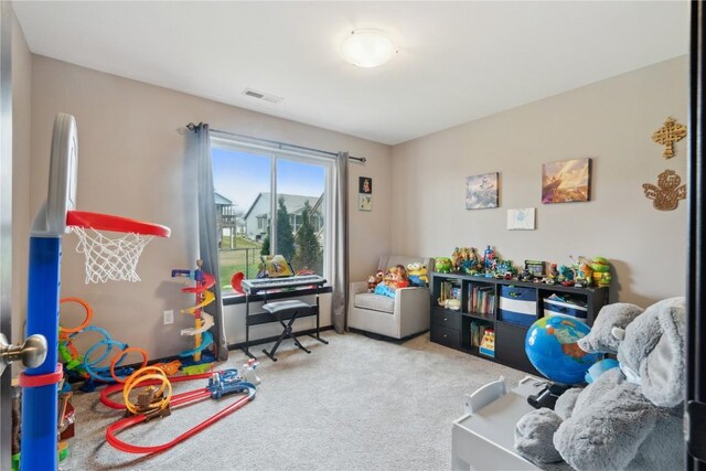 621 Doe Ave, Tiffin, IA 52340 - playroom featuring carpet floors and visible vents