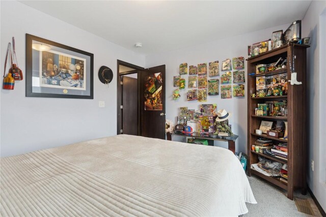 621 Doe Ave, Tiffin, IA 52340 - bedroom featuring carpet flooring