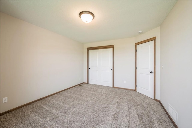 7102 Colpepper Dr SW, Cedar Rapids, IA 52404 - unfurnished bedroom featuring carpet floors, baseboards, and a closet