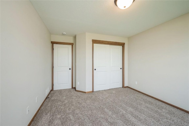 7102 Colpepper Dr SW, Cedar Rapids, IA 52404 - unfurnished bedroom featuring carpet flooring, baseboards, and a closet