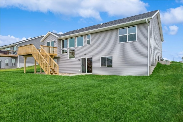 7102 Colpepper Dr SW, Cedar Rapids, IA 52404 - rear view of property featuring stairway, a wooden deck, and a yard