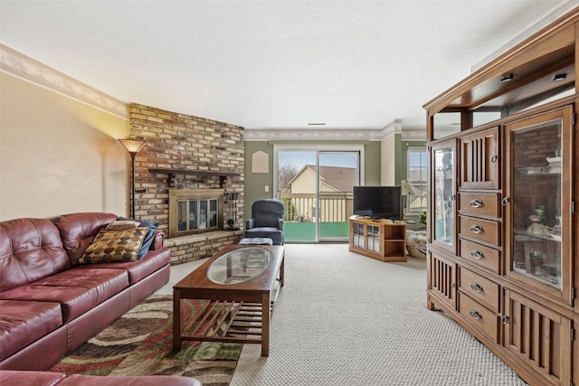 carpeted living room featuring a brick fireplace and a textured ceiling