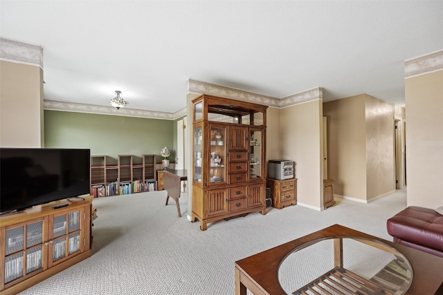 living room featuring baseboards and carpet floors
