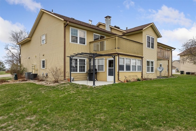 rear view of property featuring a patio area, central air condition unit, a chimney, a pergola, and a yard