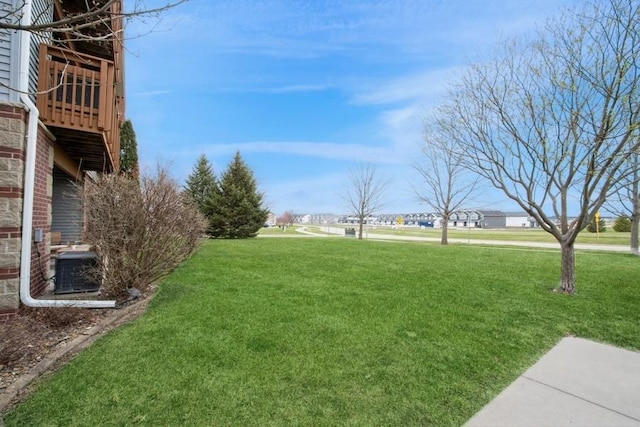 view of yard with central AC