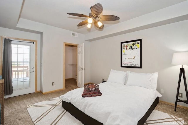 bedroom with baseboards, ceiling fan, visible vents, and carpet