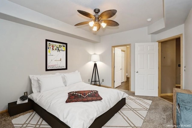 bedroom featuring baseboards, a ceiling fan, and light carpet