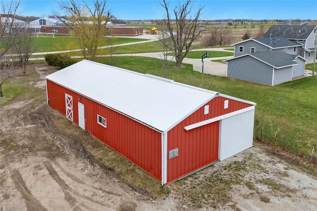 5503 Smithland Dr, Marion, IA 52302 - view of pole building with a yard