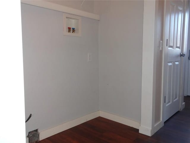 549 Marengo Ave, Marengo, IA 52301 - laundry area with dark wood-style flooring, baseboards, laundry area, and washer hookup