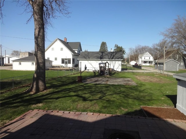 549 Marengo Ave, Marengo, IA 52301 - view of yard with a patio area, a residential view, and a fenced backyard