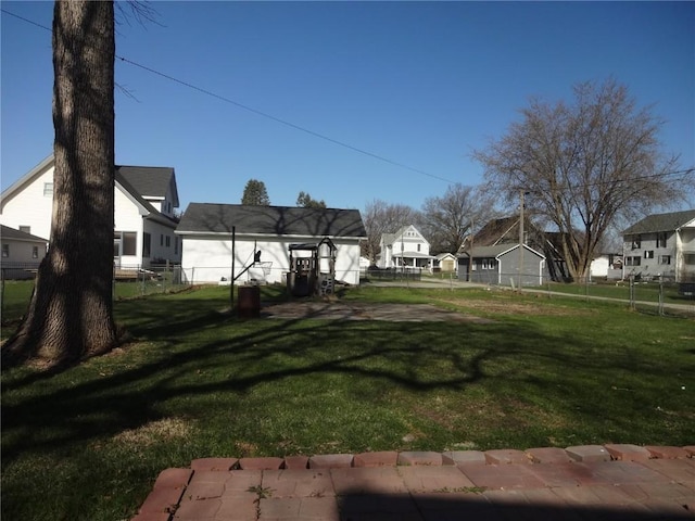 549 Marengo Ave, Marengo, IA 52301 - view of yard featuring fence and a residential view