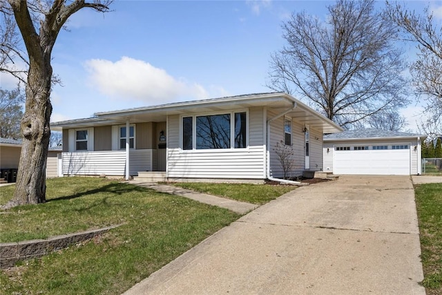 1820 Daleview Dr, Marion, IA 52302 - ranch-style home with a front lawn, a detached garage, an outdoor structure, and concrete driveway