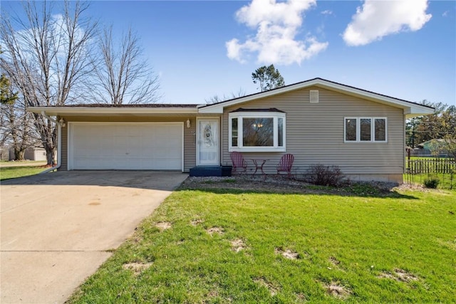view of front facade with a front lawn, fence, a garage, and concrete driveway