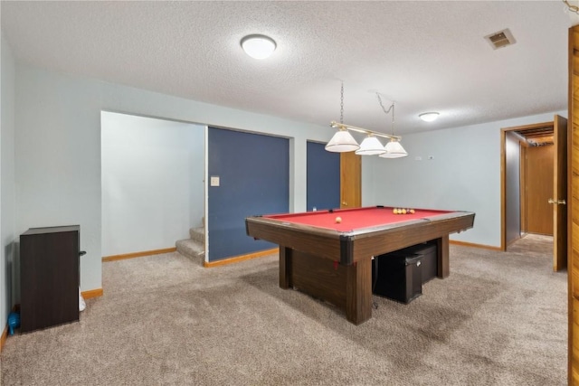 recreation room featuring pool table, baseboards, a textured ceiling, visible vents, and carpet