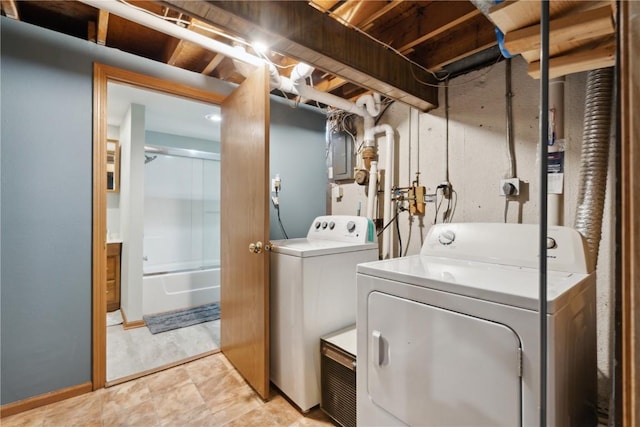 laundry area featuring laundry area and washer and clothes dryer